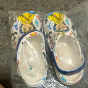 Coralline Crocs like the movie. The shoes have never been used